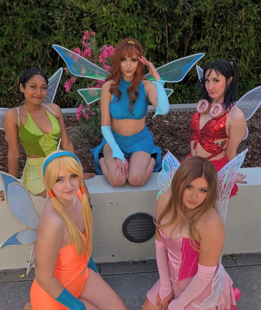 Best friends wearing Winx Halloween costumes.