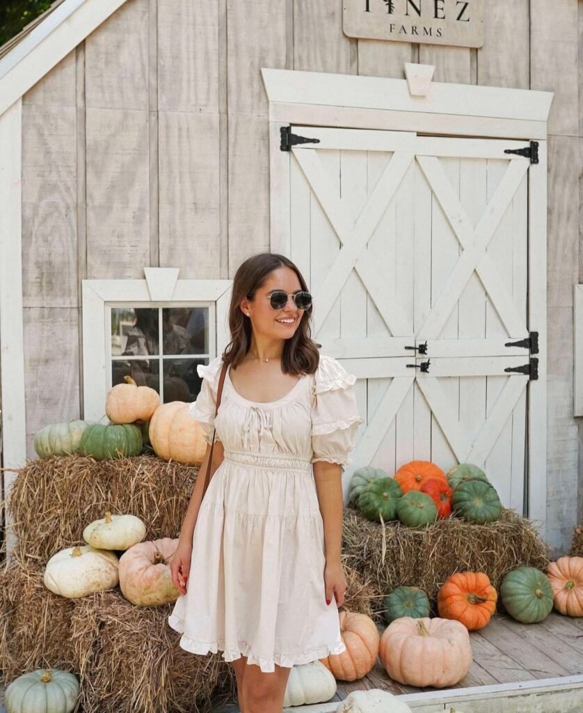 A woman wearing a white dress.