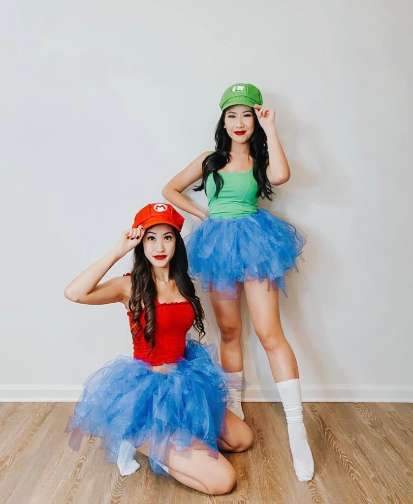 Best friends wearing Mario and Luigi Halloween costumes.