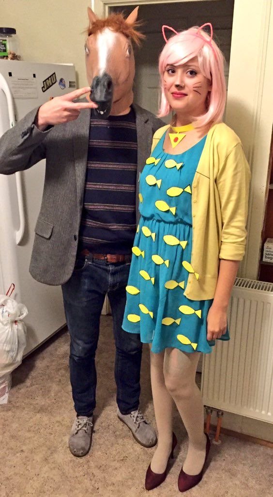 A couple wearing BoJack Horseman and Princess Carolyn Halloween costumes.