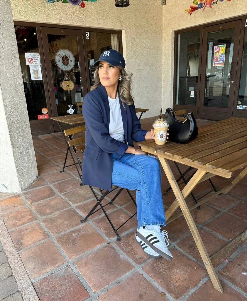 A blazer and jeans outfit.