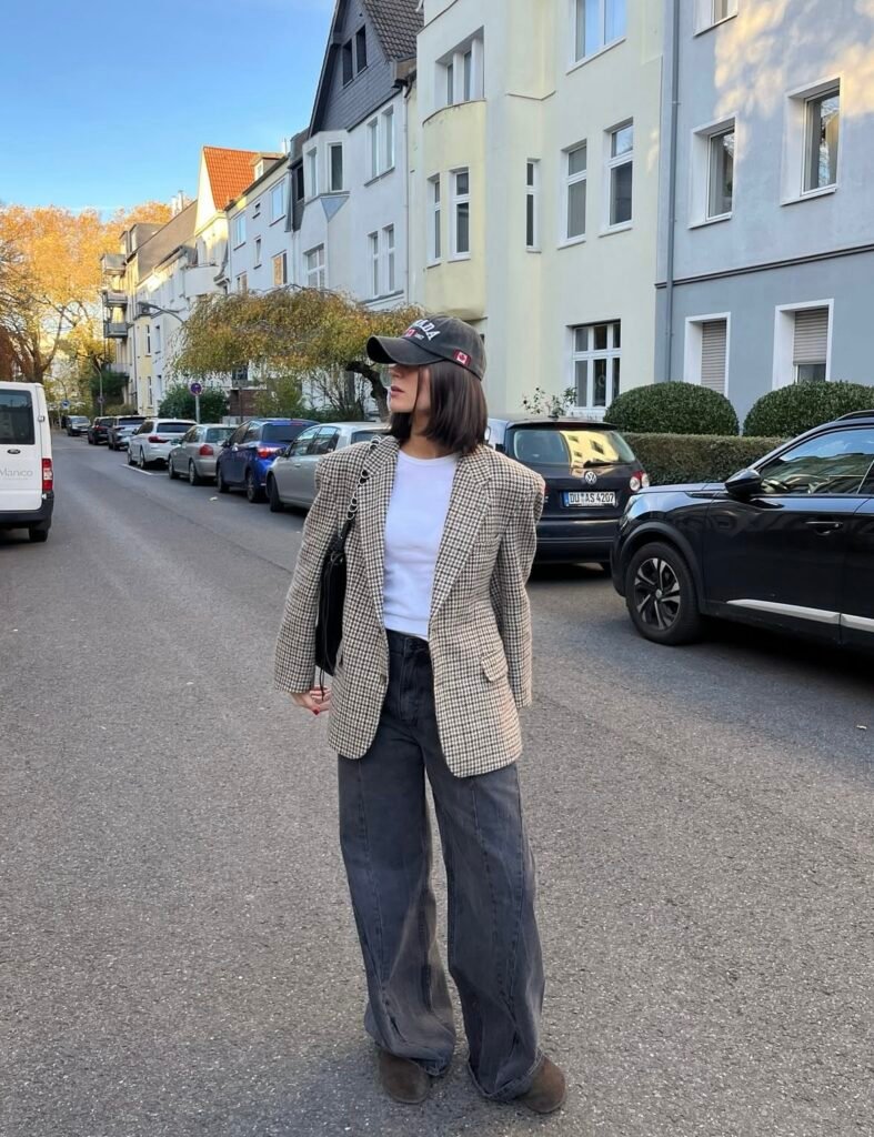 A blazer and jeans outfit.