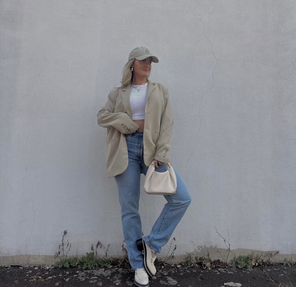 A blazer and jeans outfit.