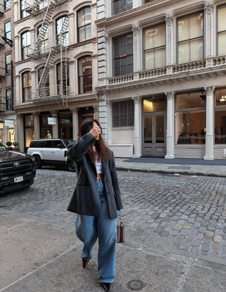 A blazer and jeans outfit.