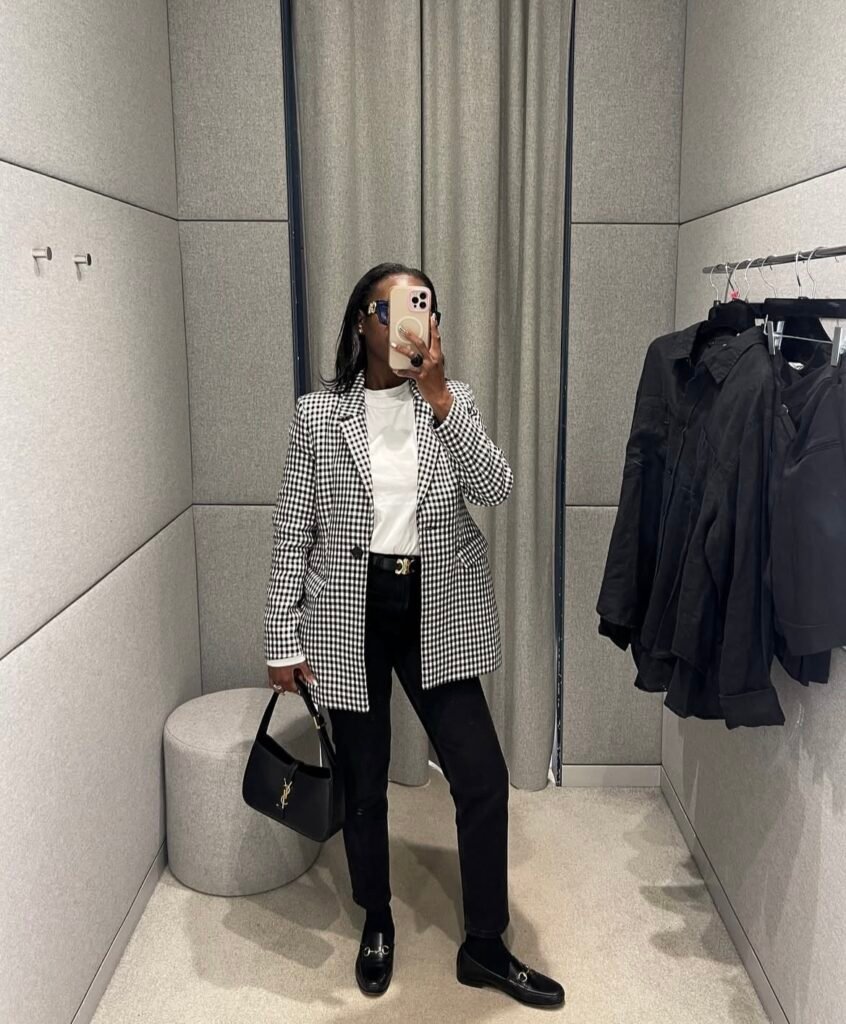 A blazer and jeans outfit.