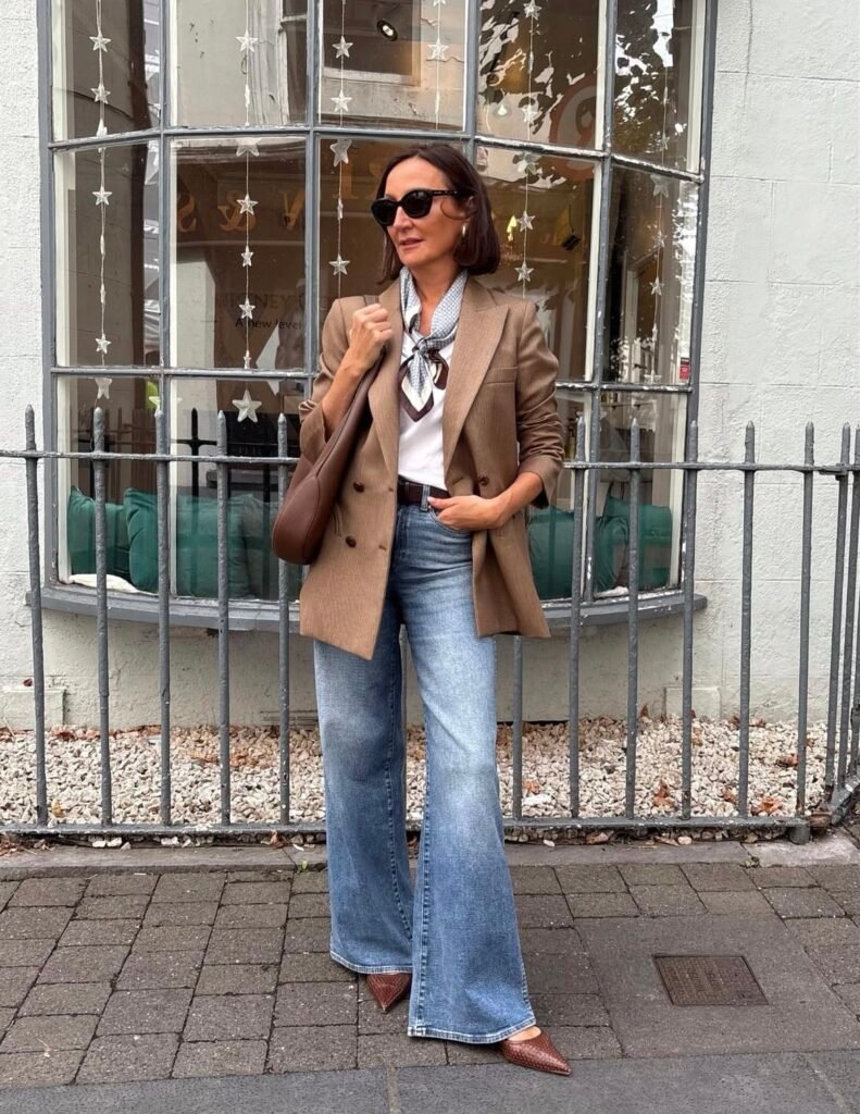 A blazer and jeans outfit.