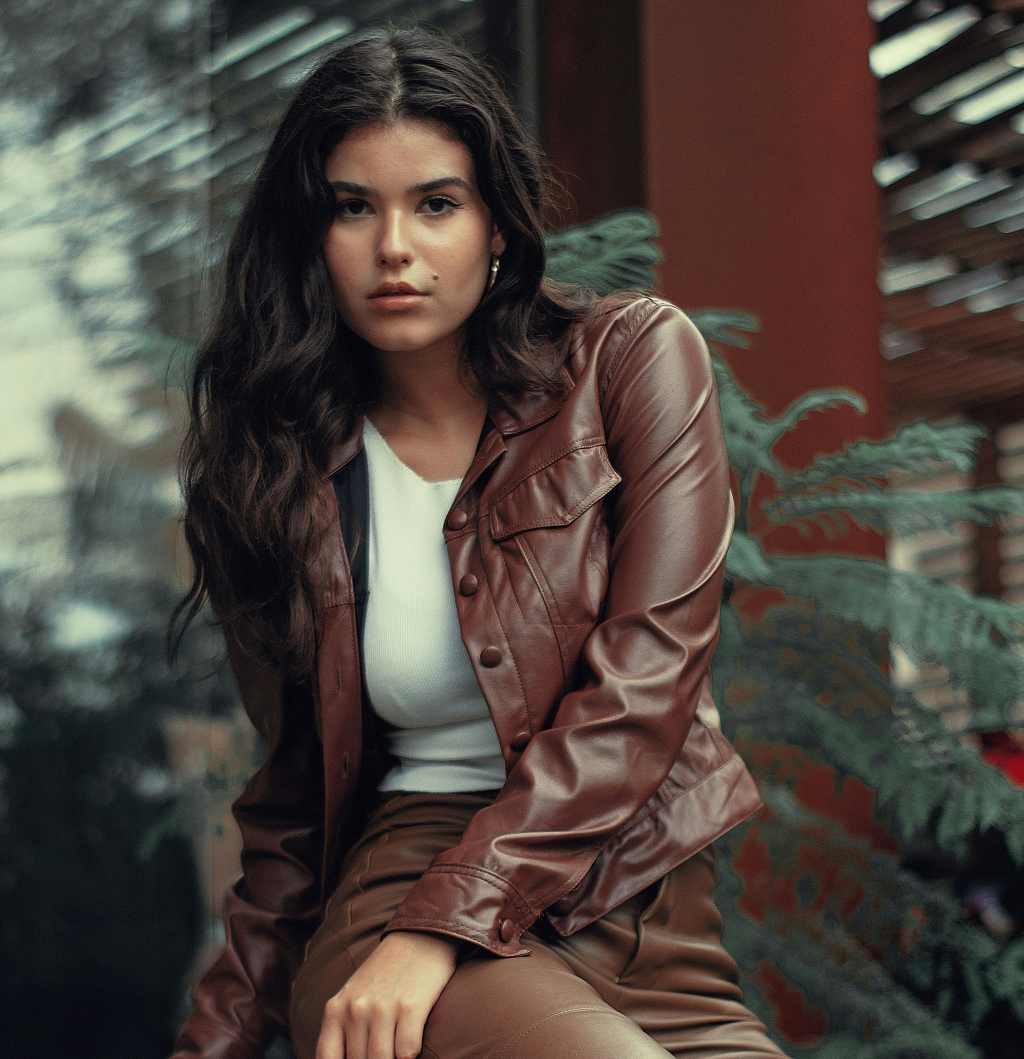 A faux leather jacket outfit.