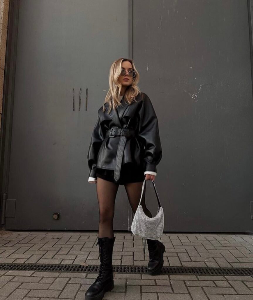 A black trench coat outfit.