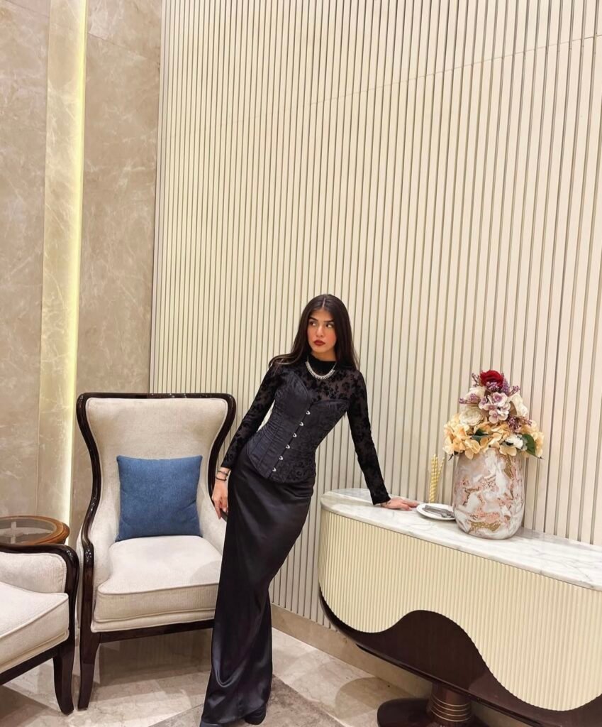 A black corset outfit.