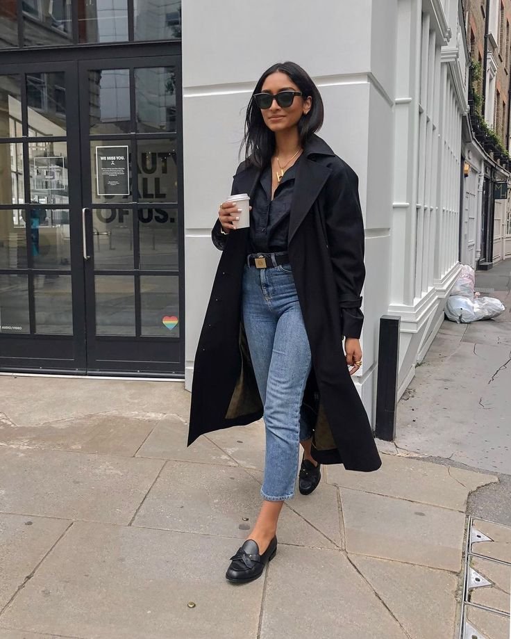 A black trench coat outfit.