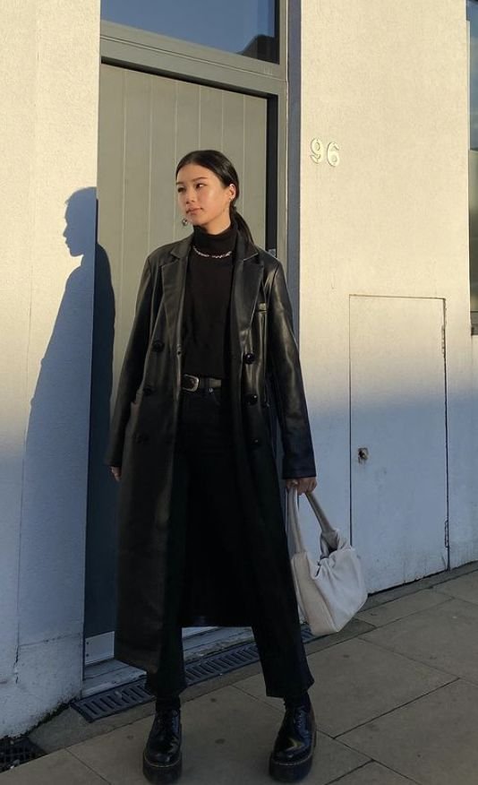 A black trench coat outfit.