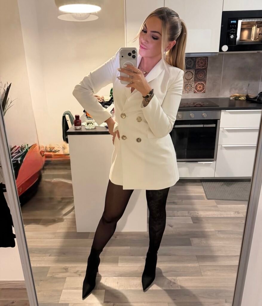 A white blazer outfit.