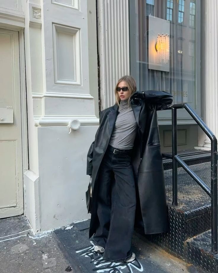 A black trench coat outfit.