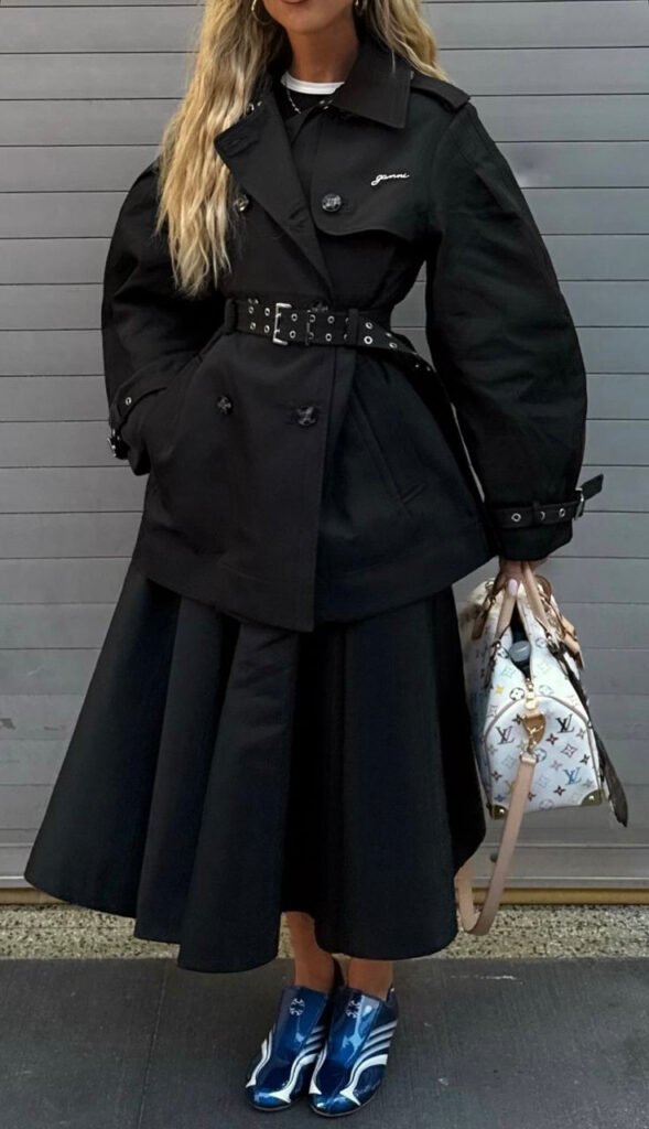 A black trench coat outfit.