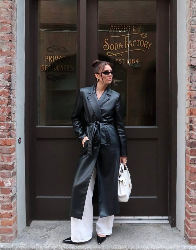 A black trench coat outfit.