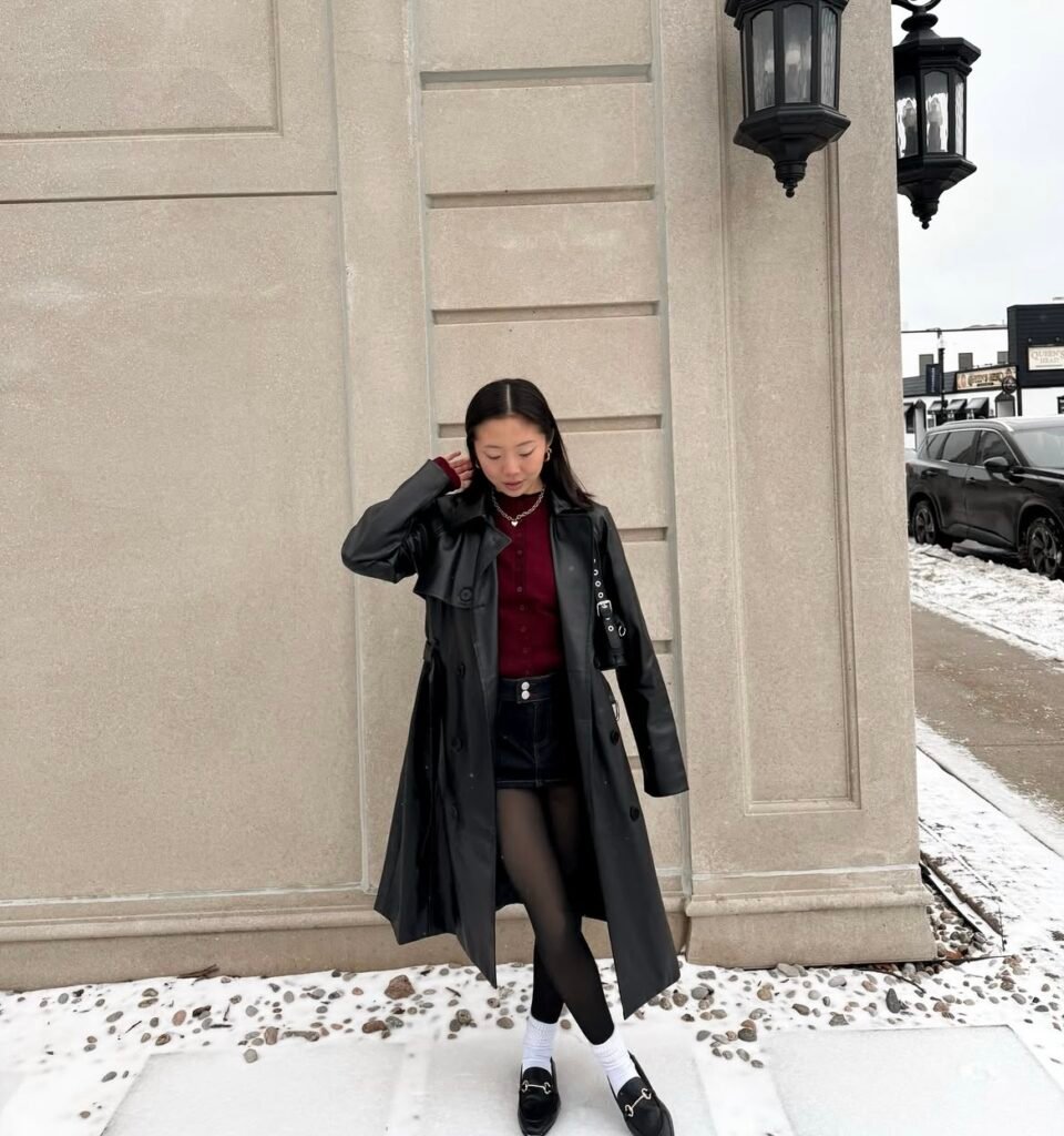 A black trench coat outfit.