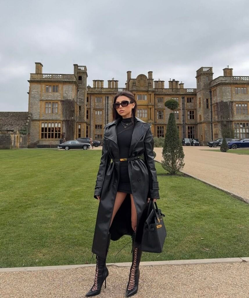 A black trench coat outfit.