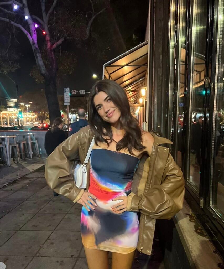 An outfit with a black faux leather jacket.