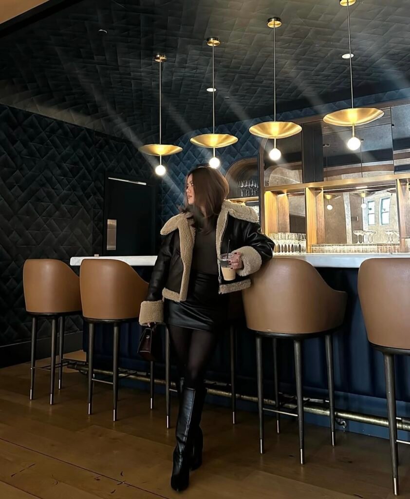 An outfit with knee-high boots.