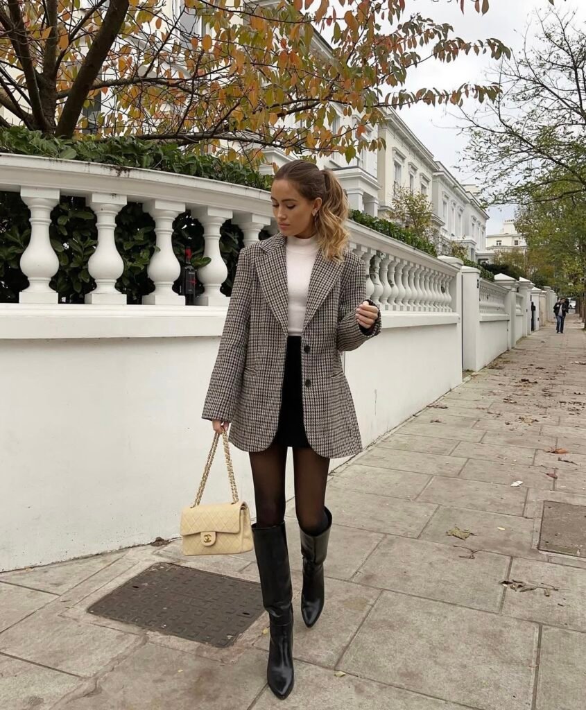 An outfit with knee-high boots.