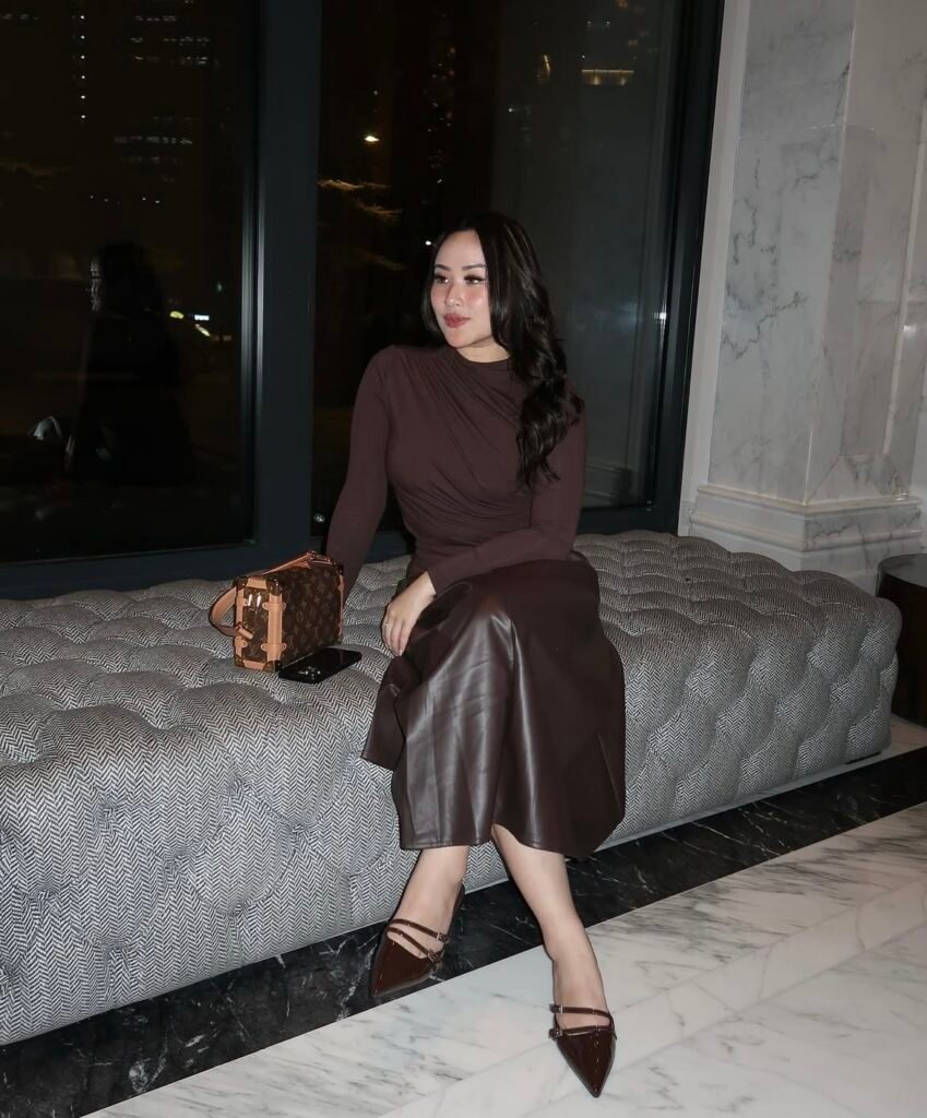 A leather skirt outfit.