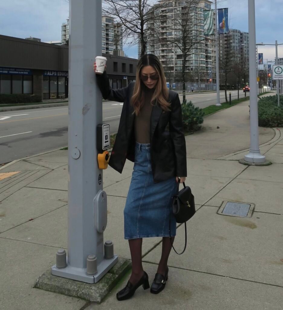 A denim skirt outfit.