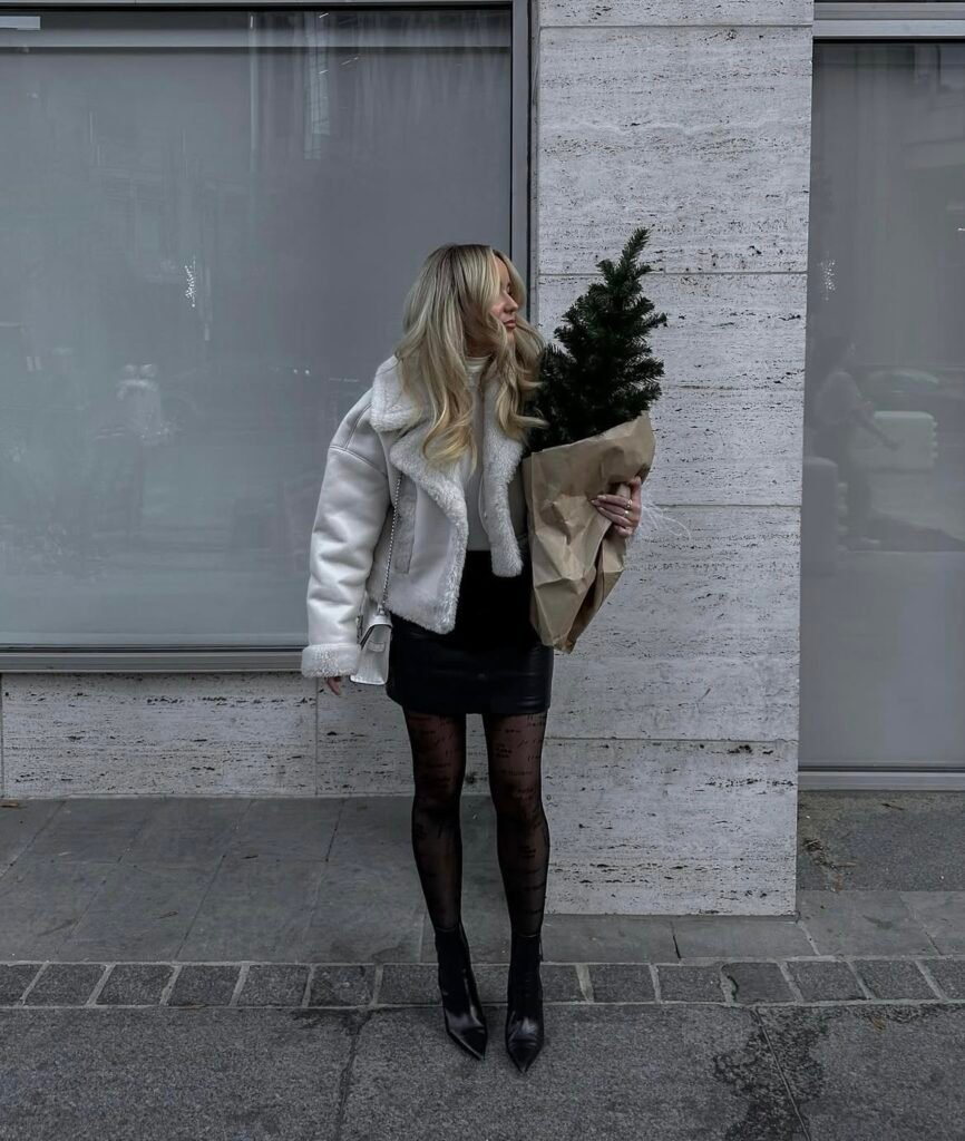 A leather skirt outfit.