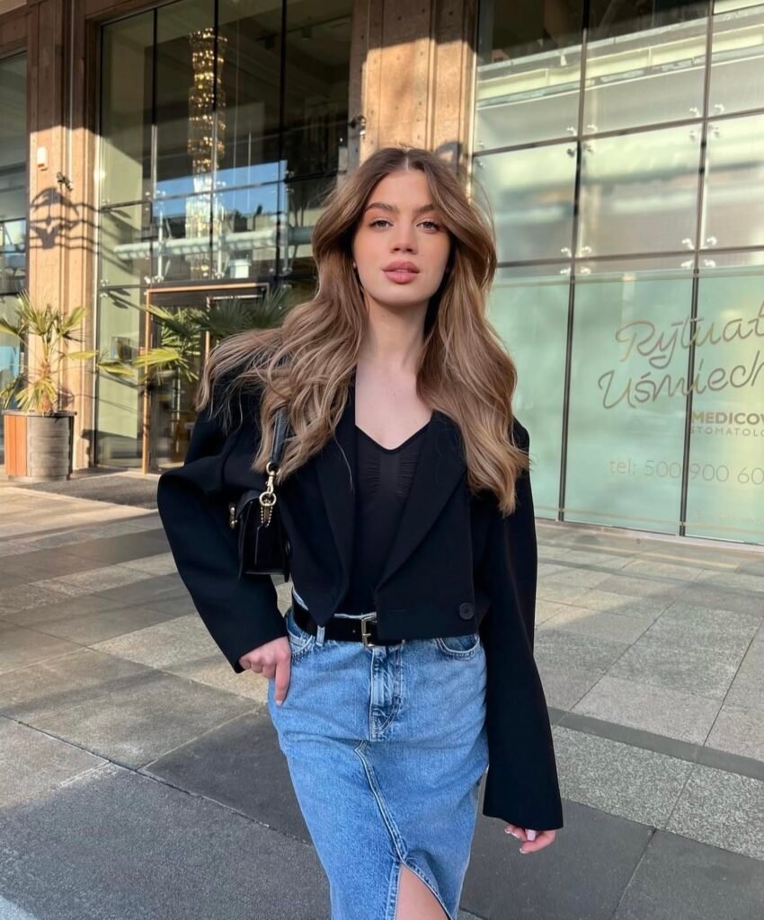 A denim skirt outfit.