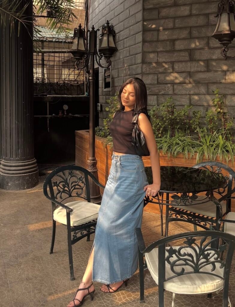 A denim skirt outfit.