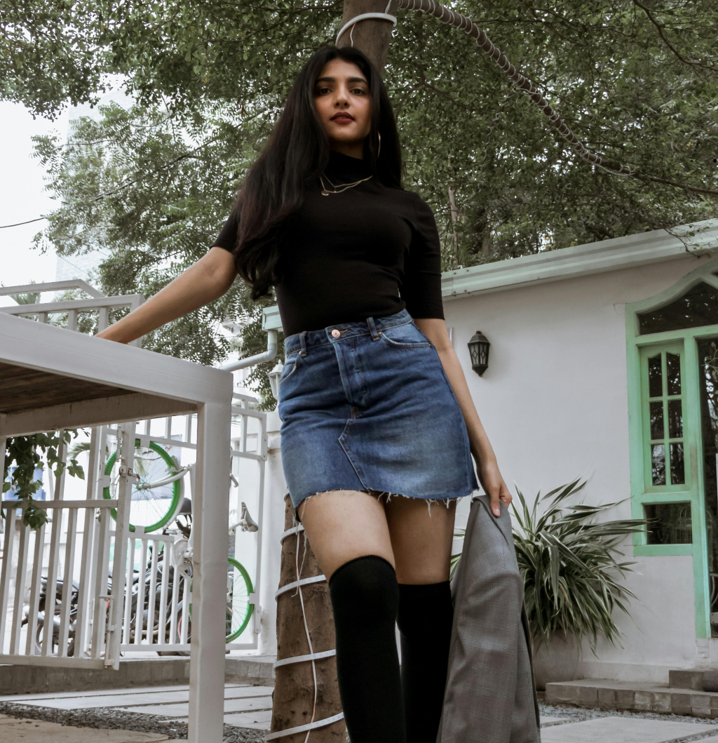 A denim skirt outfit.