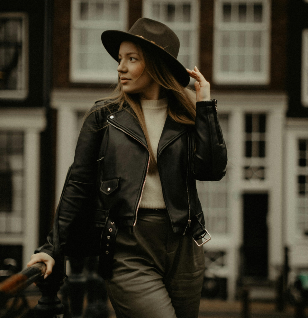 An outfit with a black faux leather jacket.